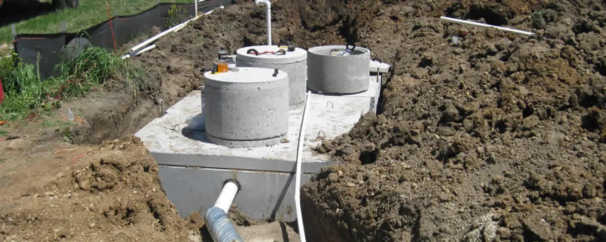 Septic system repair and installation site with tank access ports in Chandler, AZ